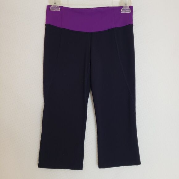 lululemon athletica Pants - Lululemon Gather and Crow Crop Leggings Black Pink Ankle Slit Women's‎ Size 4